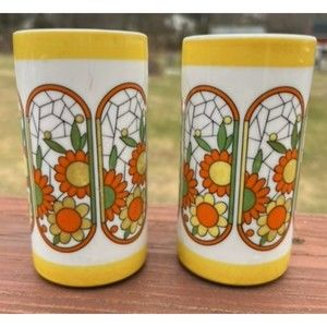 two vintage tall juice tea cups mugs bright flowers with handles 70's